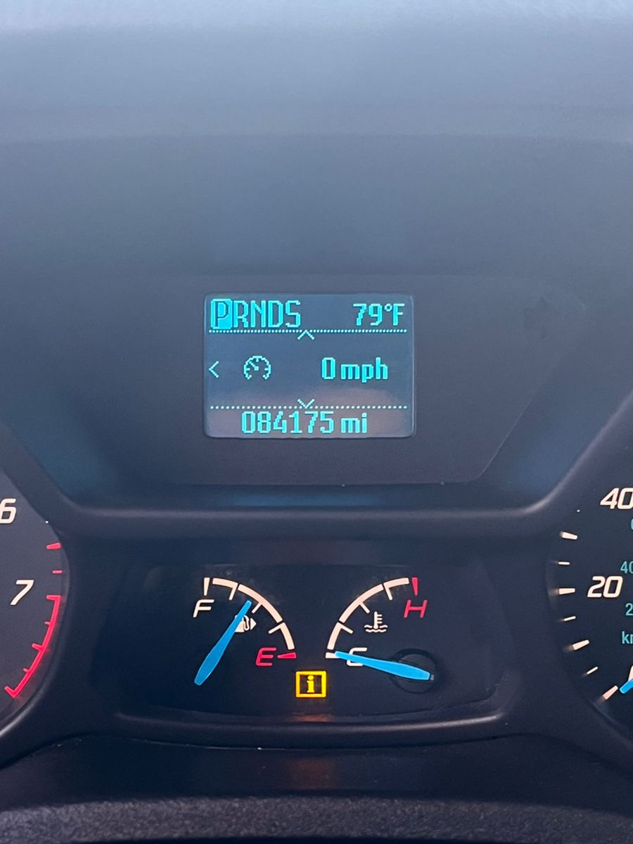 Van instrument cluster with a trip display reading 84,175 miles