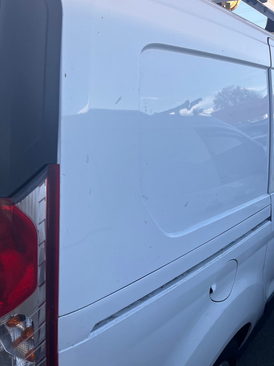 Rear barn doors of a cargo van standing open