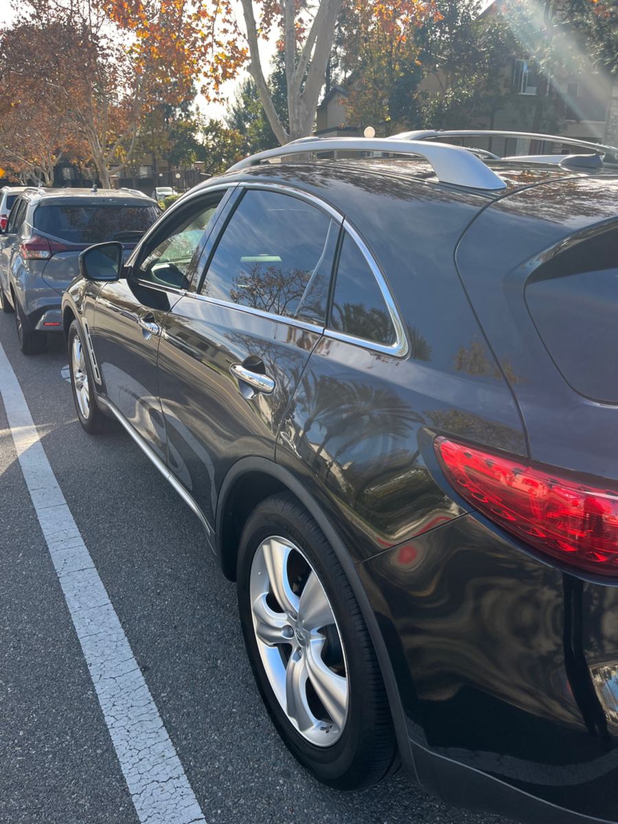 Black Infiniti FX35 photographed from the side