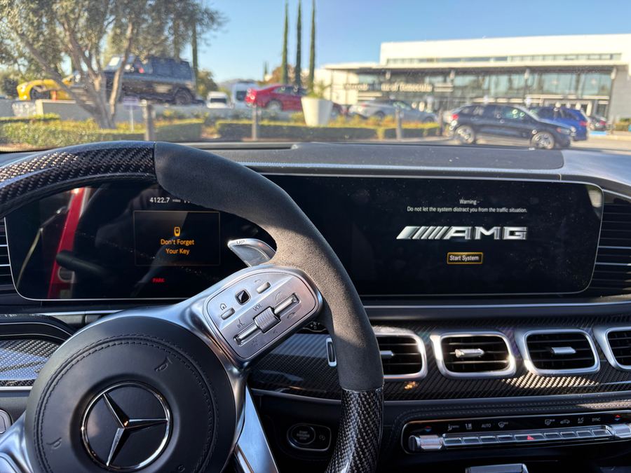 AMG steering wheel and dashboard displays inside the cabin