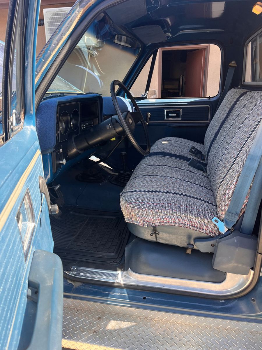 Cloth bench seat and door card inside a classic pickup