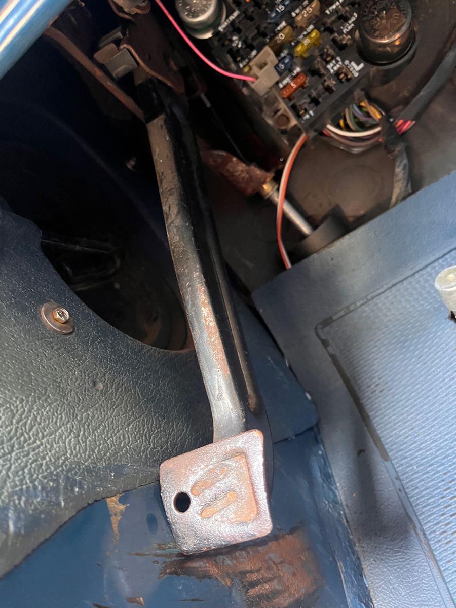 Floor pan rust around the pedal area of a classic pickup cab