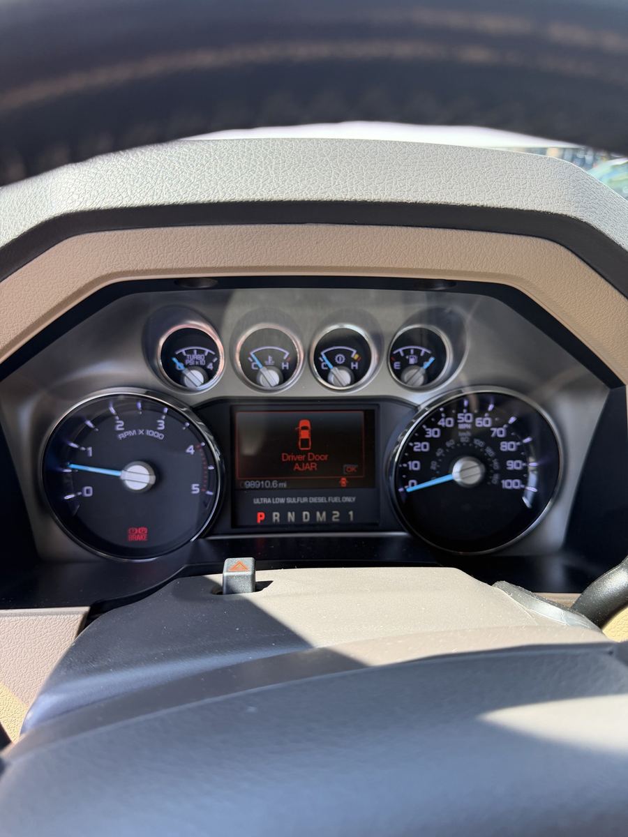 Ford Super Duty instrument cluster showing the gauges and a diesel fuel only notice
