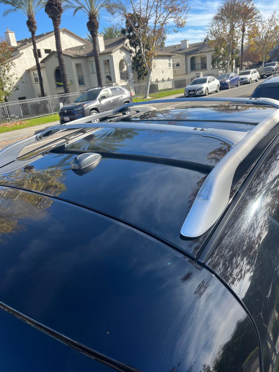 Roof, rails and sunroof of a black Infiniti FX35