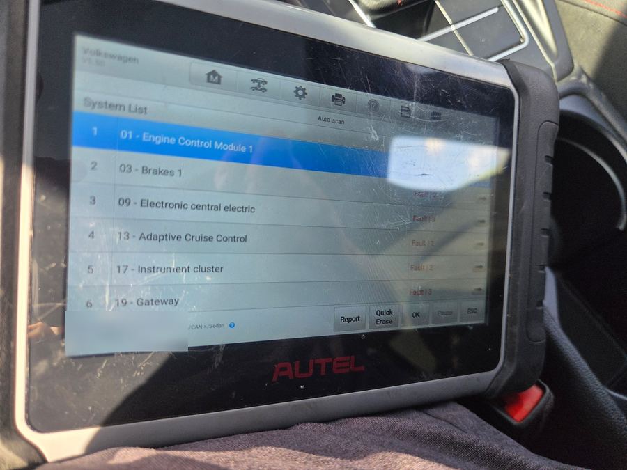 An Autel scan tool listing the control modules scanned on a 2022 Volkswagen, VIN blurred out