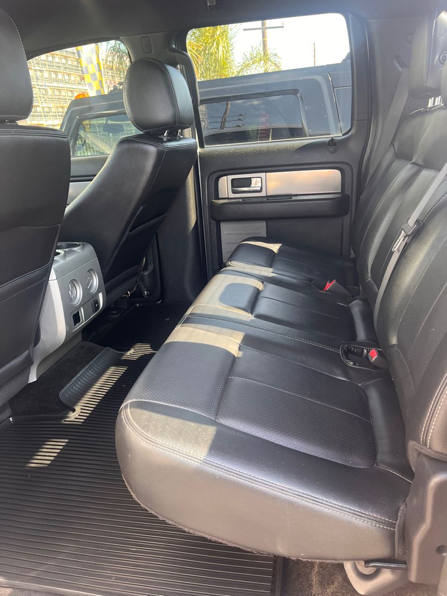 Rear bench seat and seat belts inside a crew-cab pickup