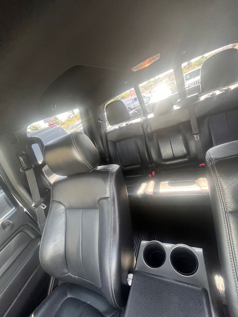 Rear bench seat and fold-down cupholders in a crew cab pickup