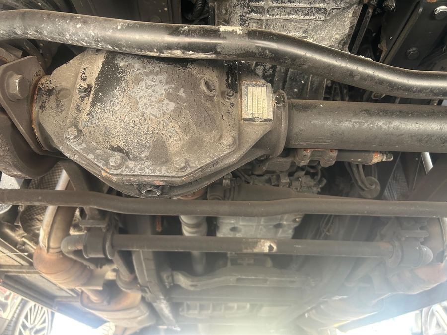 Rear differential and axle tubes seen from under a G-Class