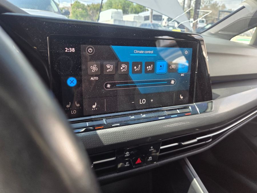 Touchscreen climate control panel in a Volkswagen dashboard