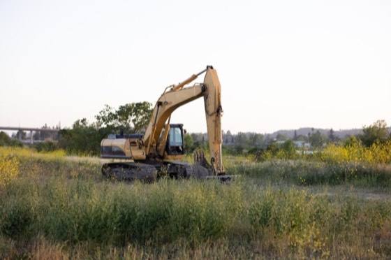 Tracked excavator on an open job site